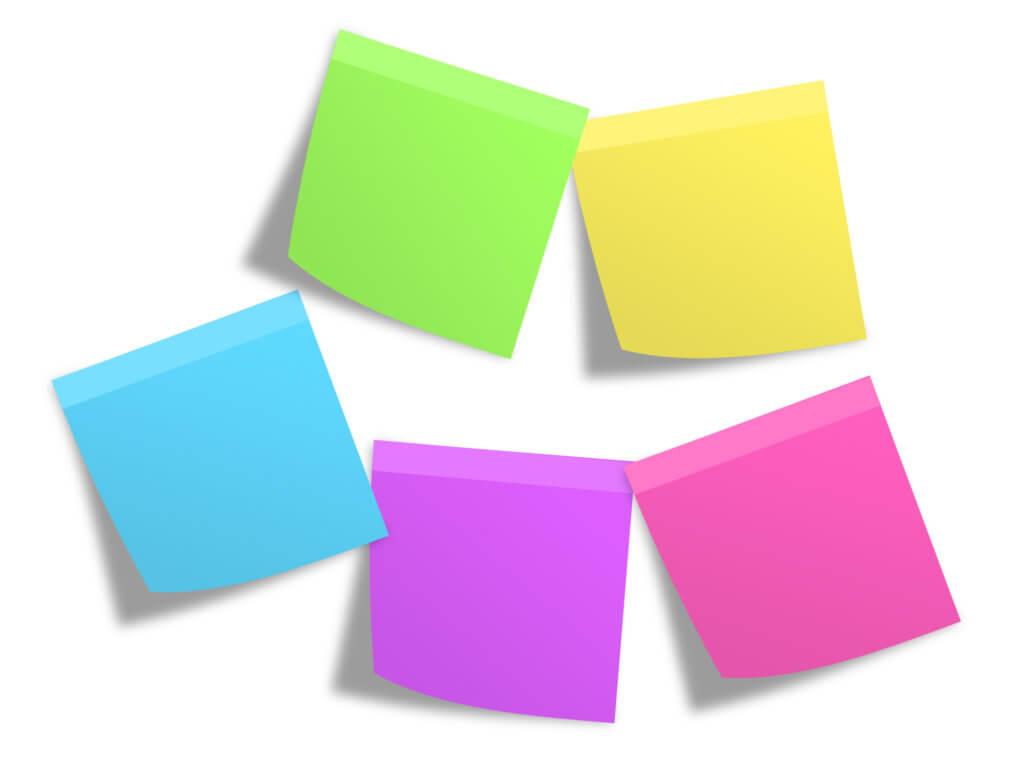 5 brightly coloured post it notes green at the top and clockwise yellow, pink, purple and blue