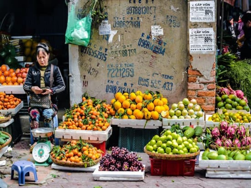 Woman selling her fruit on the street