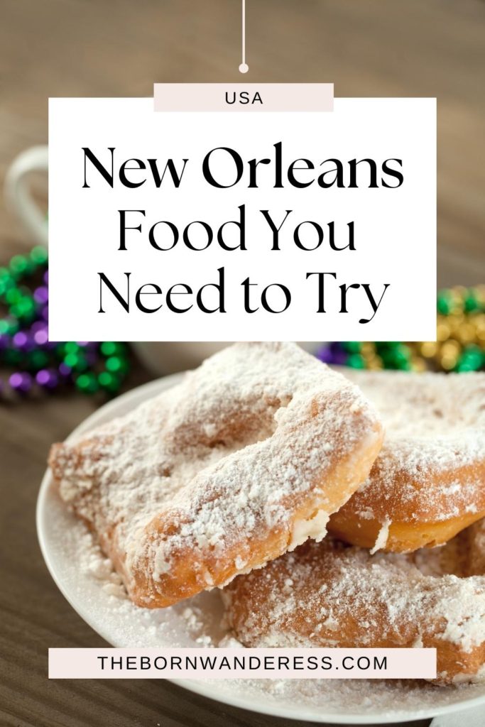 Photo of beignets with Mardi Gras beads arranged nearby. Text above the photo reads "New Orleans Food You Need to Try."