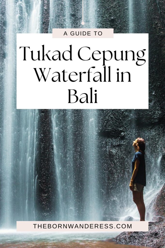 Photo of a woman standing at the base of a waterfall, looking up. Text above the photo reads: A Guide to Tukad Cepung Waterfall in Bali.