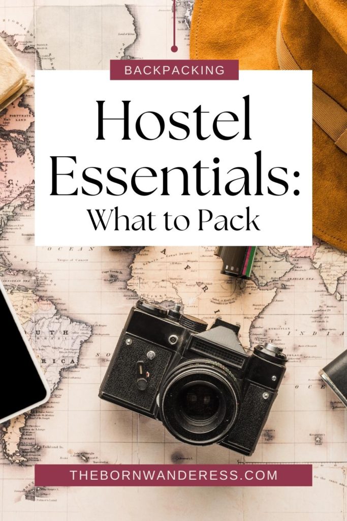 Photo of a map with a camera, iPhone, and hat. Text above the photo reads "Hostel Essentials: What to Pack."